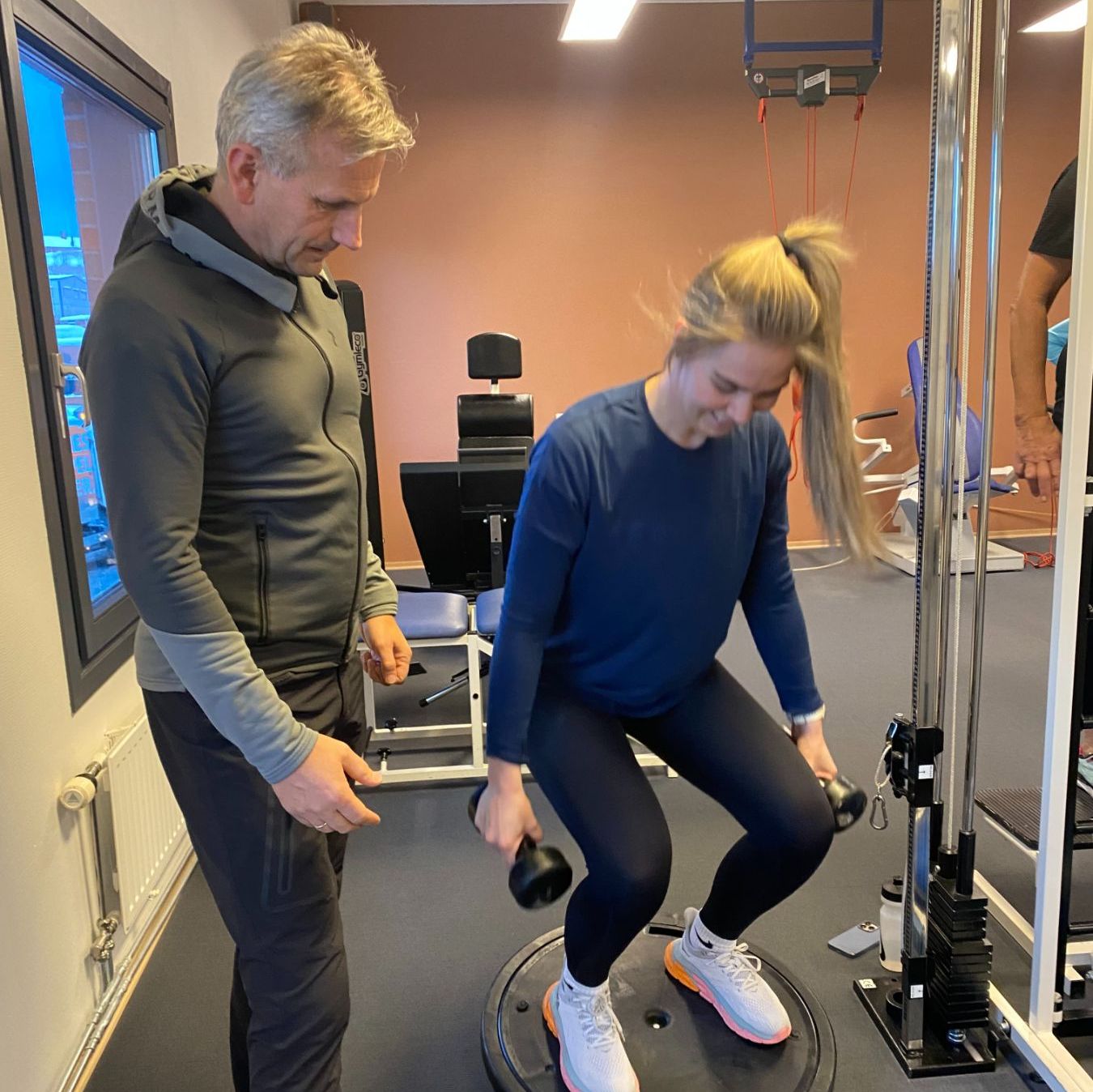 Fysioterapeut med pasient